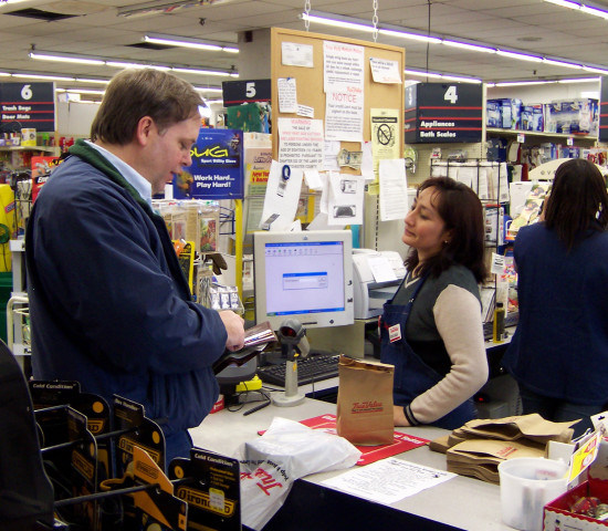 Two checkouts at Cornell Hardware, which is on computerized item-inventory control.
